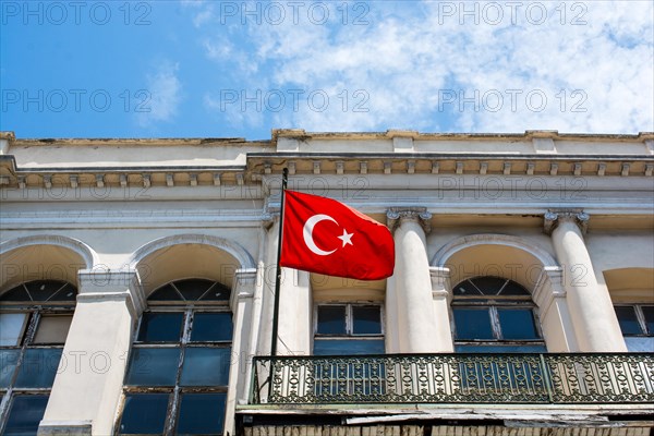 Turkish national flag hang in view in open air