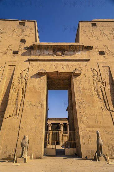 Facade with drawing of pharaohs of the Temple of Edfu in the city of Edfu