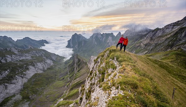 View over Saentis mountains into the valley of Meglisalp at sunrise