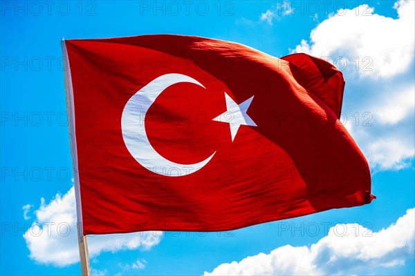 Turkish national flag hang in view in open air