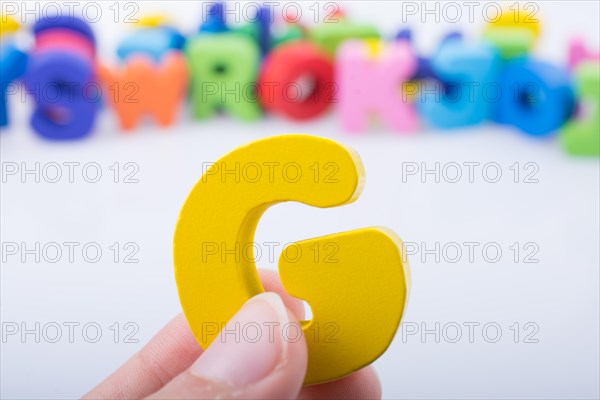 Letter cube of G of Alphabet made of wood