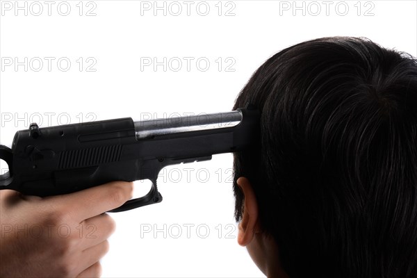 Pointing head with gun in hand on a white background