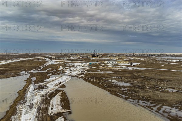 Aerial of an old wheat farm in the semi frozen earth