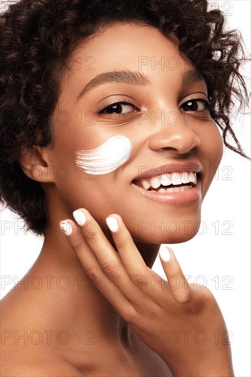 African American skincare models with perfect skin and curly hair. Beauty spa treatment concept