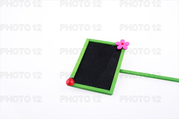 Green framed signboards with a flower and ladybug on a white background