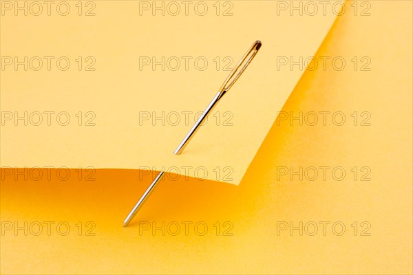 Needle pierced yellow color note paper