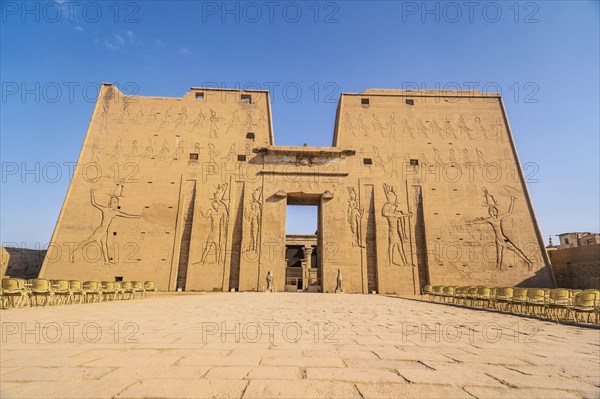 Facade with drawing of pharaohs of the Temple of Edfu in the city of Edfu