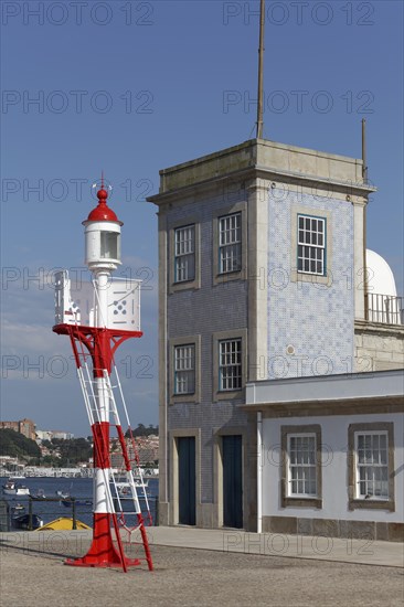 Historic lighthouse of Sao Miguel-O-Anjo and building of the Portuguese rescue organisation Instituto de Socorro a Naufragos