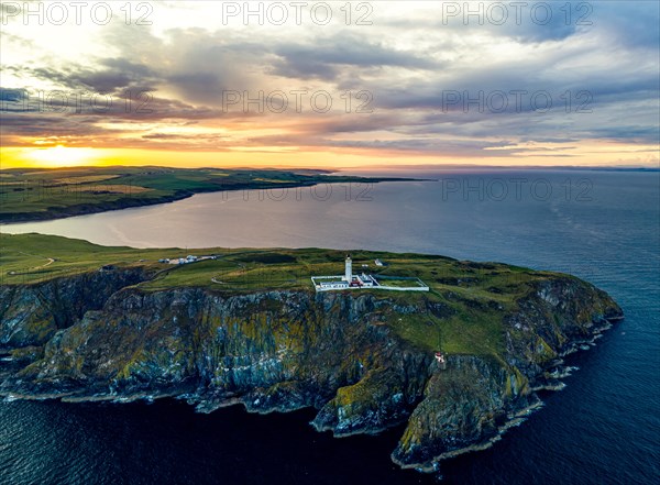 Sunset over Mull of Galloway Lighthouse from a drone