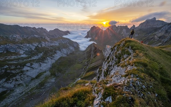 Mountaineer at sunrise at Rotsteinpass