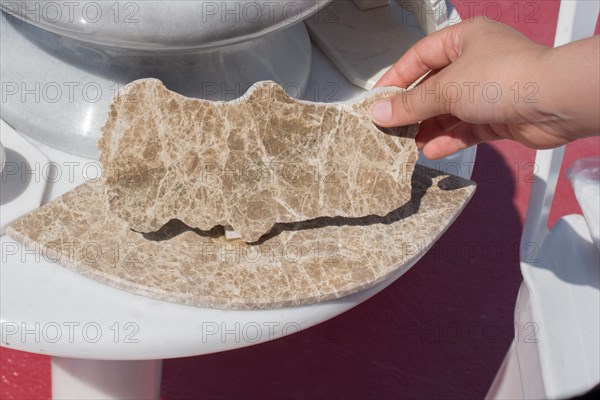 Map of Turkey outlined on marble in hand