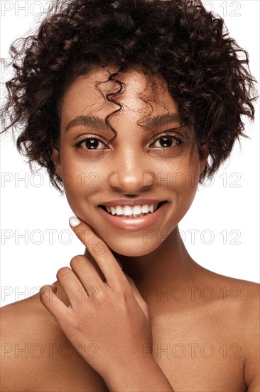 African American skincare models with perfect skin and curly hair. Beauty spa treatment concept