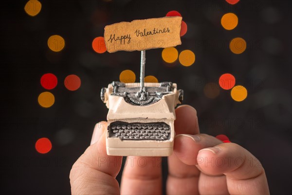 Valentine's day wording on torn typewriter as Love concept