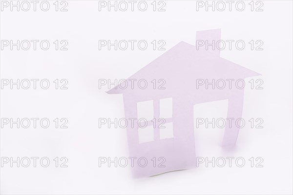 Isolated paper house with a white background