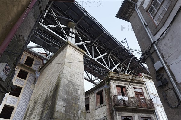 Dilapidated houses under the bridge Ponte D. Luis I