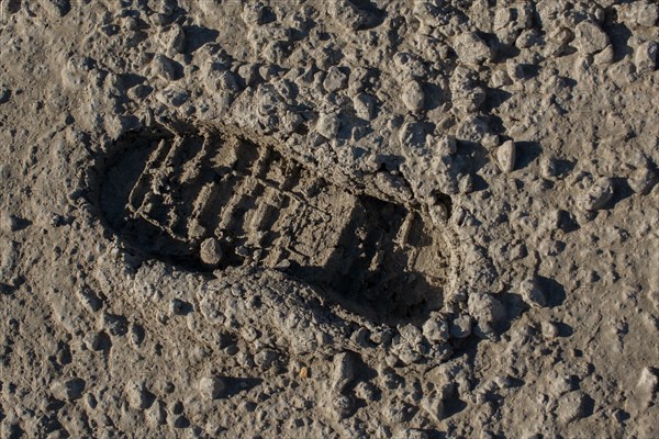 Footstep pattern seen on a concrete background