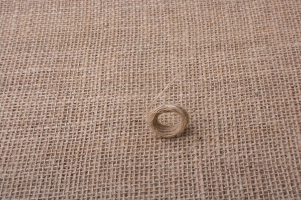 Roll of brown color linen string paper background