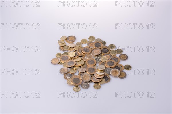 Turkish Lira coins together shape a round circle form on white background