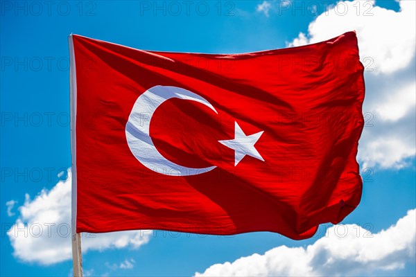 Turkish national flag hang in view in open air