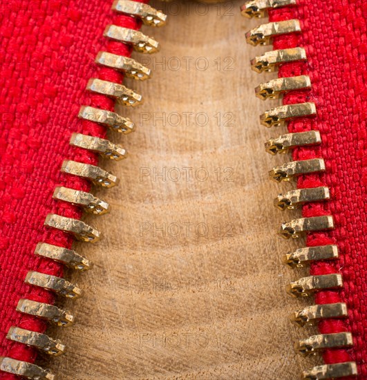 Closeup of a colorful zipper with metal teeth