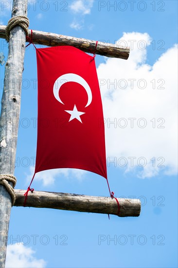 Turkish national flag hang in view in open air