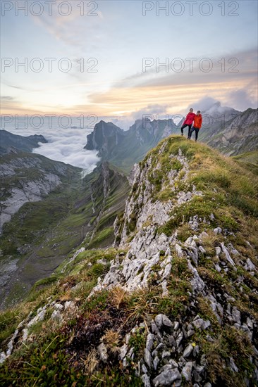 View over Saentis mountains into the valley of Meglisalp at sunrise