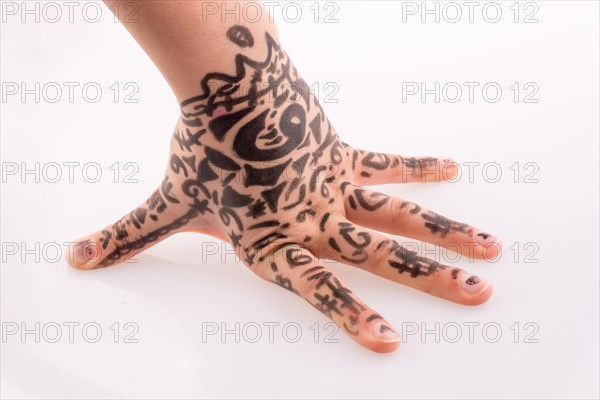 Hand with tattoo on a white background