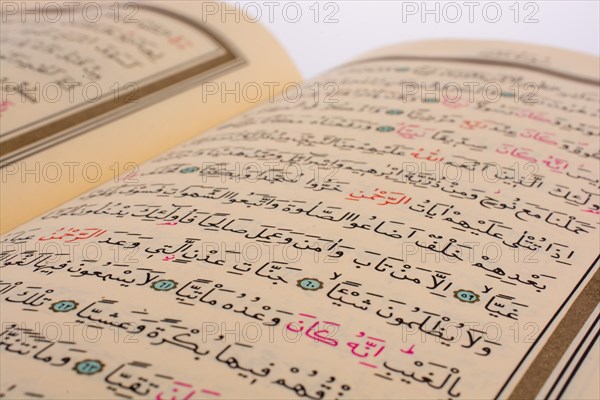 The Holy Quran on a white background