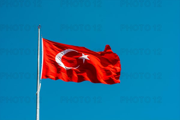 Turkish national flag hang on a pole in open air