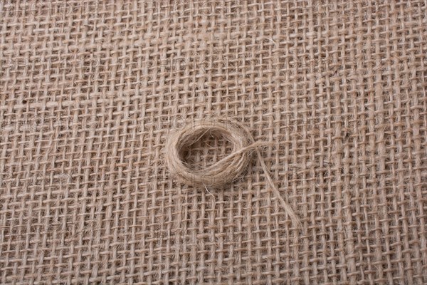 Roll of brown color linen string paper background