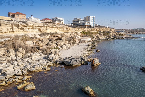 Aerial of the sandstone cliffs and promenade in Aktau