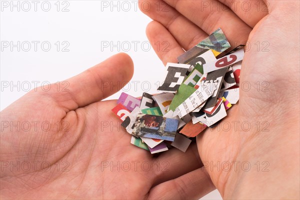 Torn Newspaper Titles on hand