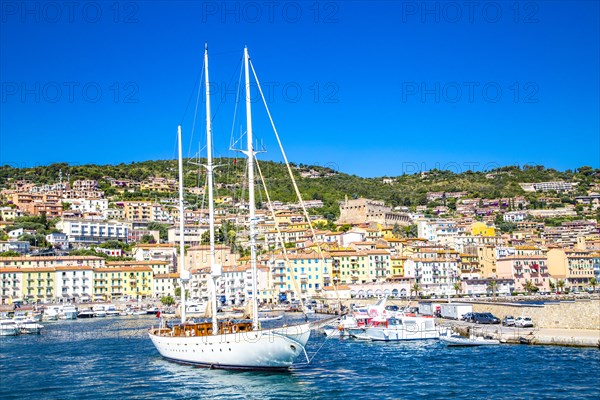 Two-master sailing boat leaving the harbour