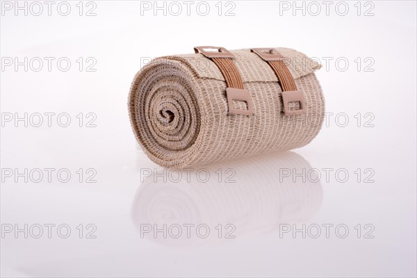 Rolled bandage on a white background