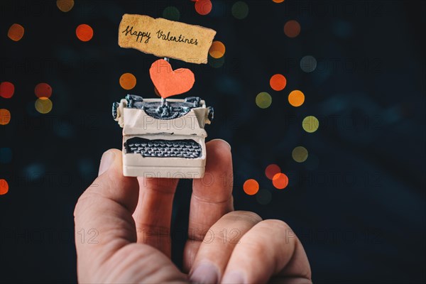 Valentine's day wording on torn typewriter as Love concept