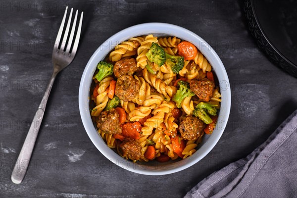 Bowl with meal made of fusilli pasta