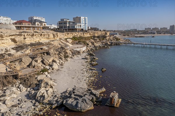 Aerial of the sandstone cliffs and promenade in Aktau