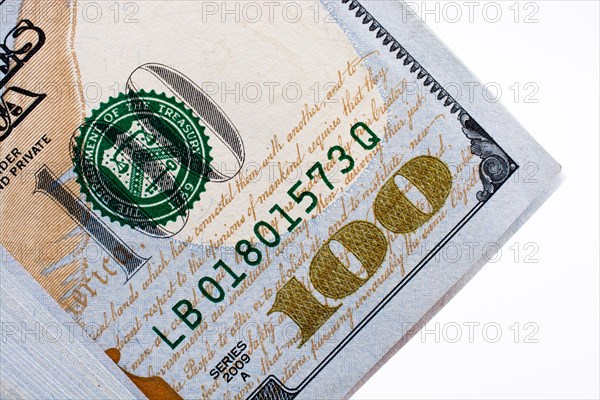 American 100 dollar banknotes made of paper placed on white background