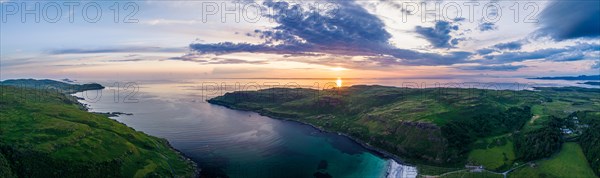 Panorama of Calgary Beach and Bay at sunset from a drone