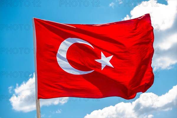 Turkish national flag hang in view in open air