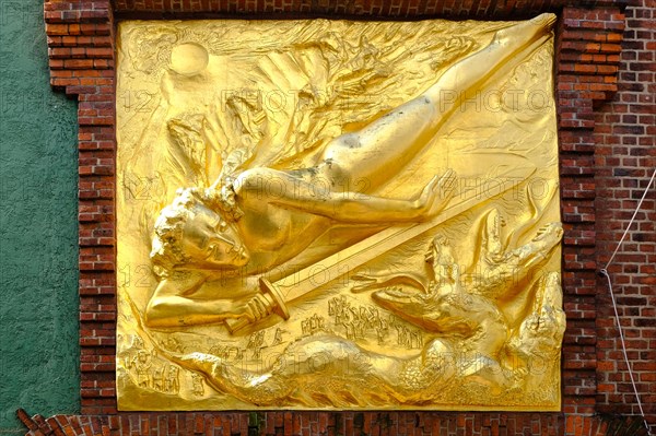 The Lightbringer gilded bronze relief by Bernhard Hoetger in the Old Town