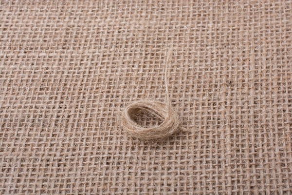 Roll of brown color linen string paper background