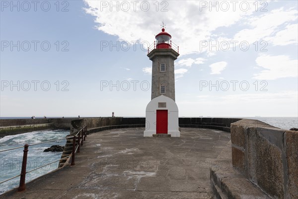 Farolim de Felgueiras lighthouse at the mouth of the Douro River into the Atlantic Ocean