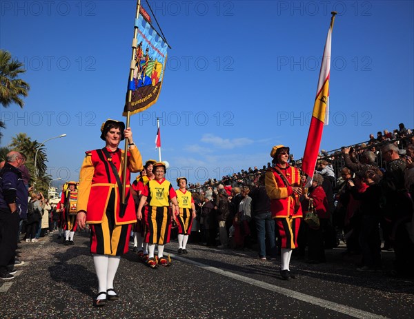 Traditional traditional costume group at the street parade in Menton