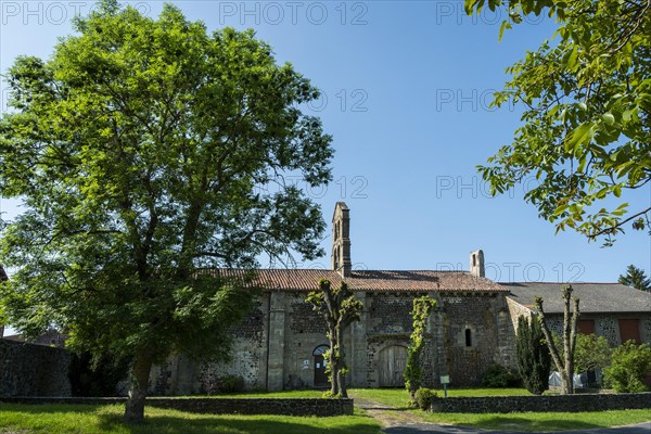 Esteil village. Church Saint Jean. Livradois-Forez Regional Nature Park. Puy de Dome department. Auvergne-Rhone-Alpes. France