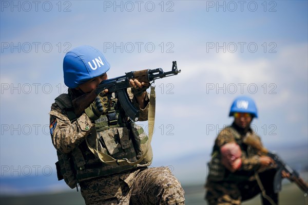 Mongolian soldiers wear UN