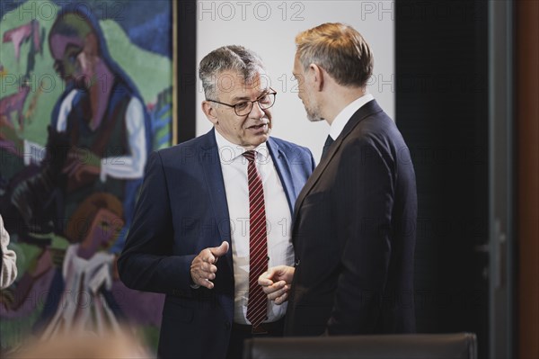 (R-L) Christian Lindner (FDP), Federal Minister of Finance, and Werner Gatzer, State Secretary at the Federal Ministry of Finance, photographed during the weekly meeting of the Cabinet at the Federal Chancellery in Berlin, 05.07.2023. The Cabinet intends to adopt the draft for the 2024 federal budget at this meeting, Berlin, Germany, Europe