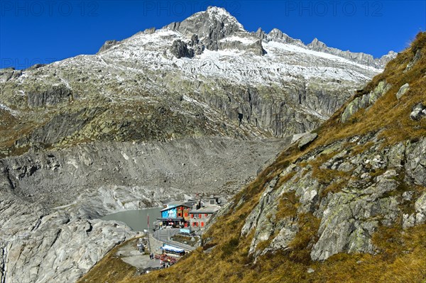 At the entrance to the ice grotto in the Rhone glacier