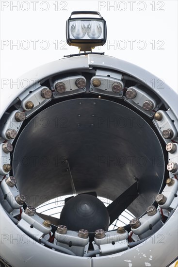 Nozzles on the inner rim of a propeller gun