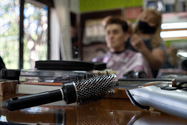 Close-up of hairdressing elements. Out of focus background